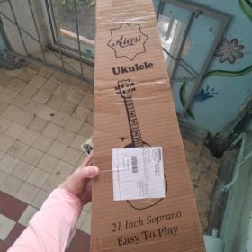 Explore the Melodic World with Our 23 Inch Ukulele  for Sale photo review