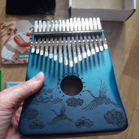 Explore the Enchanting World of Kalimba - The Perfect Musical Instrument for Sale photo review