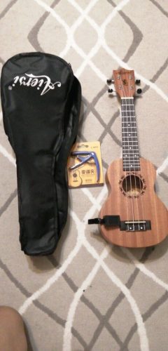 Explore the Melodic World with Our 23 Inch Ukulele  for Sale photo review