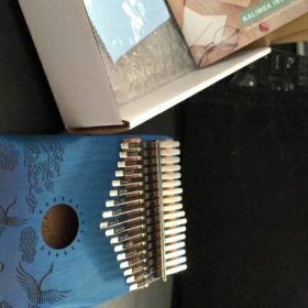 Explore the Enchanting World of Kalimba - The Perfect Musical Instrument for Sale photo review