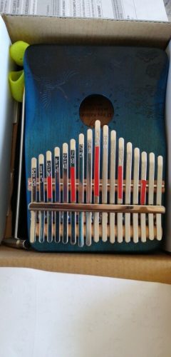 Explore the Enchanting World of Kalimba - The Perfect Musical Instrument for Sale photo review