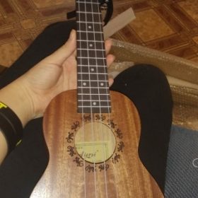 Explore the Melodic World with Our 23 Inch Ukulele  for Sale photo review