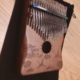 Explore the Enchanting World of Kalimba - The Perfect Musical Instrument for Sale photo review