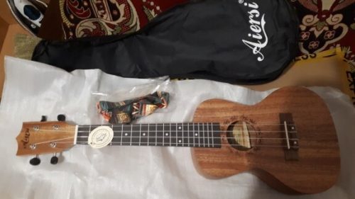 Explore the Melodic World with Our 23 Inch Ukulele  for Sale photo review