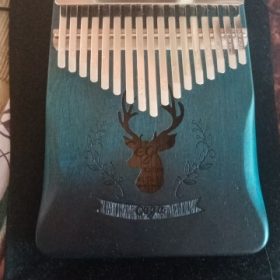 Explore the Enchanting World of Kalimba - The Perfect Musical Instrument for Sale photo review