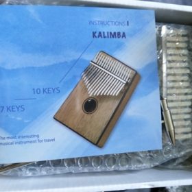 Explore the Enchanting World of Kalimba - The Perfect Musical Instrument for Sale photo review
