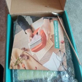 Explore the Enchanting World of Kalimba - The Perfect Musical Instrument for Sale photo review