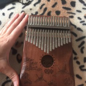 Explore the Enchanting World of Kalimba - The Perfect Musical Instrument for Sale photo review