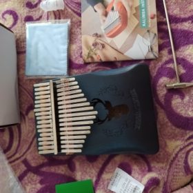 Explore the Enchanting World of Kalimba - The Perfect Musical Instrument for Sale photo review