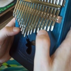 Explore the Enchanting World of Kalimba - The Perfect Musical Instrument for Sale photo review
