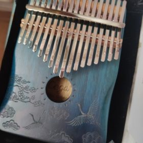 Explore the Enchanting World of Kalimba - The Perfect Musical Instrument for Sale photo review