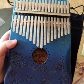 Explore the Enchanting World of Kalimba - The Perfect Musical Instrument for Sale photo review